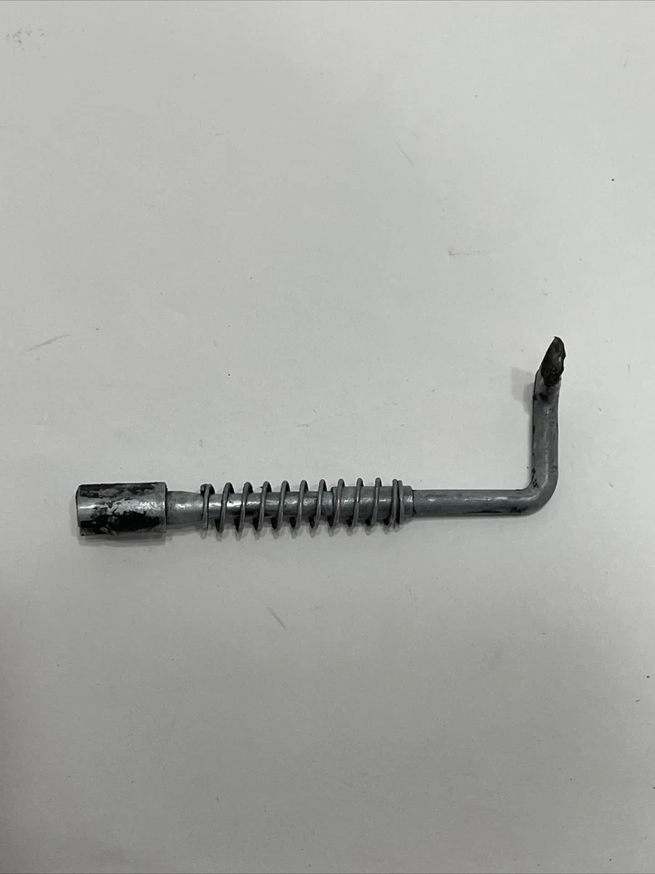 Barra de acelerador de motosierra con cremallera Homelite con resorte Foto 1 de 3