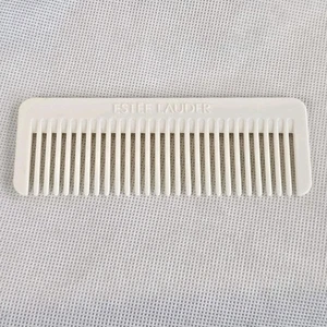 Peine de dientes anchos Estee Lauder vintage marfil blanco roto 4,75 pulgadas - Imagen 1 de 4