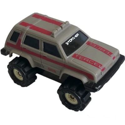 De colección 1986 McDonald's Happy Meal gris Stomper SR-5 4x4 Toyota Tercel Foto 1 de 4