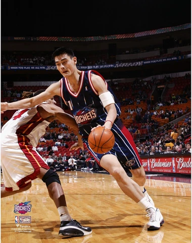 Yao Ming Houston Rockets Unsigned Dribbling Around Brian Grant Photograph Cover