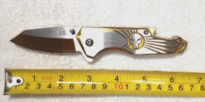 SPRING ASSISTED KNIFE GOLD AND SILVER BOTTLE OPENER GLASS BREAK PUNISHER 6.2" - Picture 1 of 7