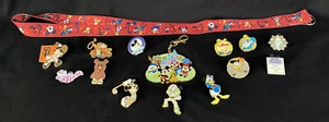 Walt Disney World Schlüsselband mit 13 Disney Sammler Pins & 1 Mickey Schlüsselanhänger - Bild 1 von 7