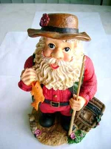 A beautiful Figurine of Santa holding a Fishing Pole 9"tall 5"wide5"deep Painted - Imagen 1 de 9