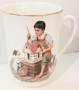 1983 Norman Rockwell Porzellan Kaffeebecher mit Goldrand "A Dollhouse for Sis" - Bild 1 von 6