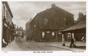 REAL PHOTO POSTCARD OF OLD MAIN STREET, BINGLEY, (NEAR KEIGHLEY), WEST YORKSHIRE - Foto 1 di 2