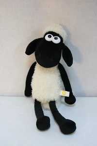 Juguete de peluche Aurora Shaun La Oveja Piel Crema Largo Negro Brazos y Piernas - Imagen 1 de 3