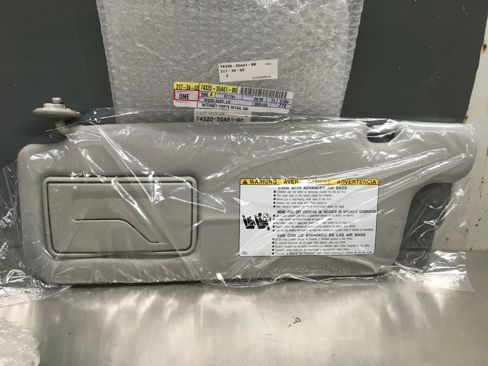 OEM  TOYOTA FJ CRUISER DRIVER SIDE SUN VISOR FITS 2010-2014 GRAY COLOR - Image 1 of 1