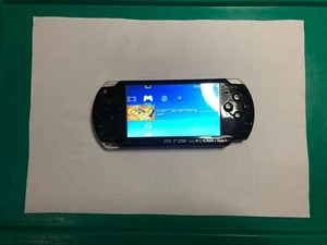 PlayStation PSP Slim Sony Console 2002 Nera 64 GB Usata Funzionante - Foto 1 di 21