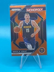 Baloncesto Panini Prizm Nikola Jokic 2023-23 pepitas #PS1 Monopoly naranja/124 - Imagen 1 de 2