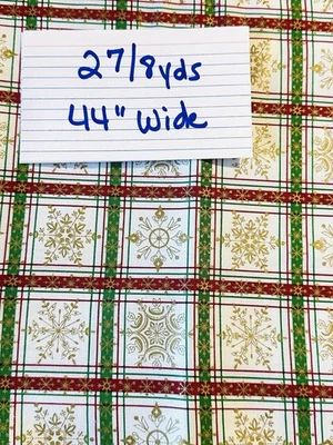 Tela de algodón navideña de Fabri—colcha copos de nieve dorados en cuadrados rojos verdes Foto 1 de 4