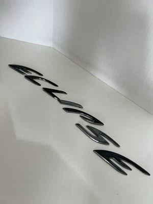 OEM 2006-2012 Mitsubishi Eclipse Rear Bumper Trunk Emblem Badge Letter Script - Image 1 of 3