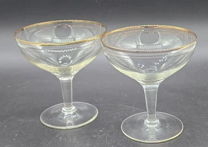 PAIR OF GOLD-RIMMED CHAMPAGNE GLASSES, 10cm TALL, 10cm DIAMETER - Picture 1 of 2