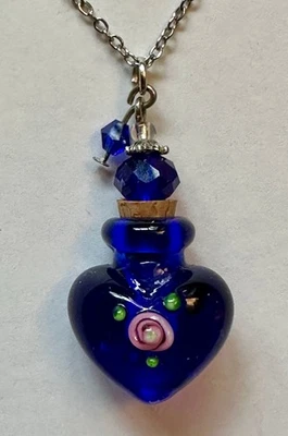 JARRÓN URNA CORCHO Y TOPPER AZUL CRISTAL FLOR COLGANTE 1 1/2" COLLAR 24" ACERO LEER Foto 1 de 4