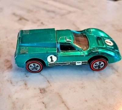 Ford J-Car 1967 Redline Hot Wheels vintage, verde azulado Foto 1 de 4