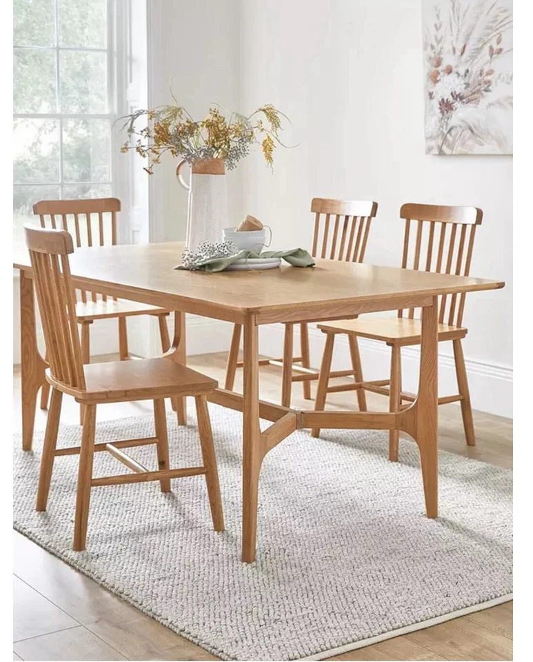CLEARANCE SALE Oak dining table and 4 chairs ex display perfect condition  - Image 1 of 4