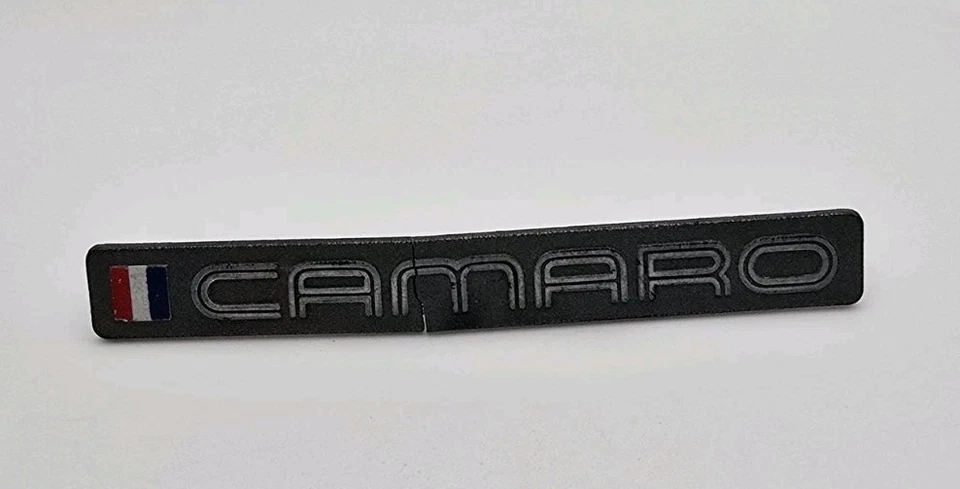 BROKEN 1988 CHEVROLET CAMARO DASHBOARD EMBLEM OEM - Image 1 of 4