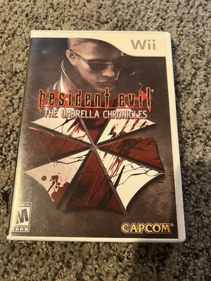 Resident Evil: The Umbrella Chronicles (Nintendo Wii, 2007) Completo Probado en Caja Original Foto 1 de 3