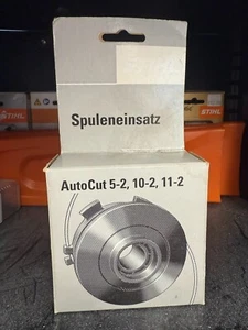 OEM STIHL 4004 710 4300 SPOOL WITH LINE - Picture 1 of 1