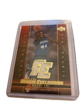 2003 04 Upper Deck Rookie Exclusives Jersey Ndudi Ebi Timberwolves Rookie Card