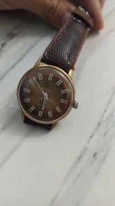 Orologio meccanico vintage Ymolux carica manuale - raro epoca URSS - quadrante marrone - funzionante - Foto 1 di 15