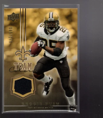 A0032- 2008 Upper Deck Team Colors Jerseys Gold #TCRB Reggie Bush Jersey /299 - Image 1 of 2