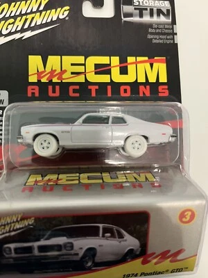 JOHNNY LIGHTNING MECUM AUCTIONS 1974 PONTIAC GTO WHITE LIGHTNING WITH TIN CASE - Image 1 of 4
