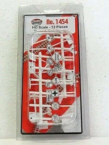MODEL POWER 1454 HO Scale ROAD AND RAIL SIGNS 12pcs New - Picture 1 of 4
