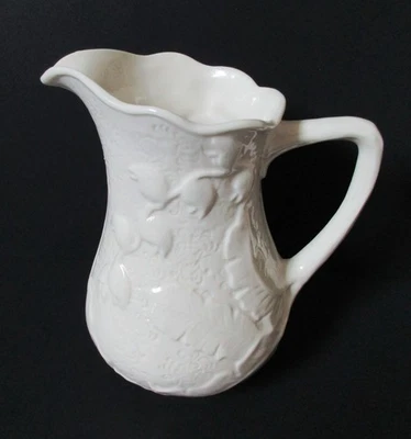 Jarrón jarra vintage Godinger & Co de porcelana crema/marfil diseño frondoso en relieve Foto 1 de 4