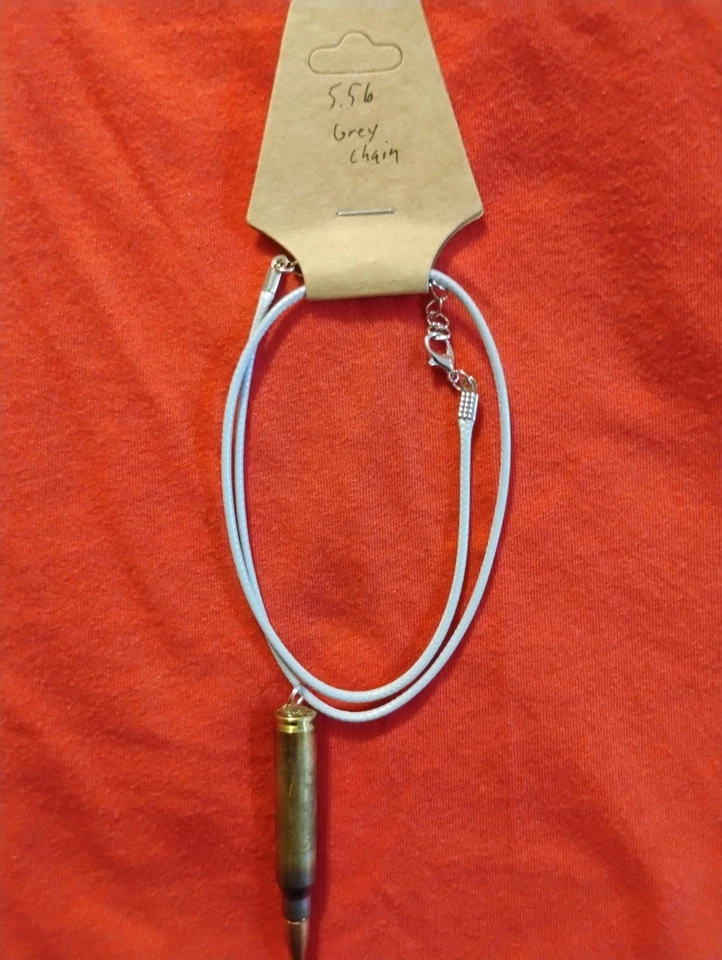 Collar Bala 5.56, Militar, Policía, Caza y Tiro, Cadena Gris Foto 1 de 1