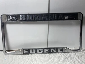 Vintage Joe Romania Chevrolet Eugene Auto Dealership Metal License Plate Frame - Picture 1 of 3