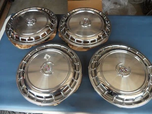 1981-1988 Cadillac Deville Seville 14" Hubcaps (4) silver w center parts - NEW - Picture 1 of 12
