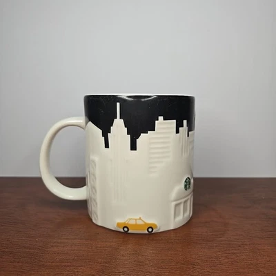 STARBUCKS New York City Collector Series Mug 2012 16 oz Skyline Taxi - Image 1 of 4
