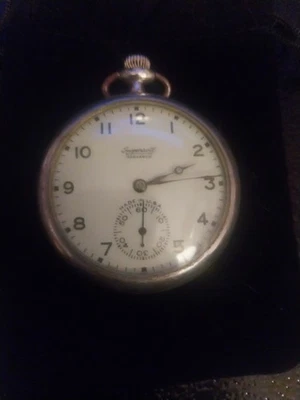 1900s 16s Ingersoll Reliance Pocket Watch Winchester Gun Theme Case Runs Well. - Image 1 of 3