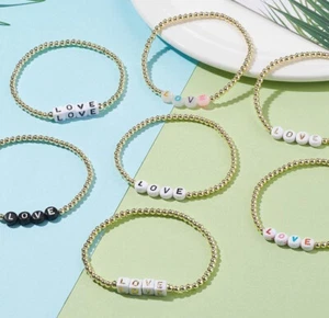 7 - 21 elasticated 'LOVE' mixed gold tone friendship bracelets, lovely gifts - Picture 1 of 7