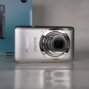 Canon IXUS 115 HS / PowerShot ELPH 100 HS 12.1MP 4x Digital Camera Silver, Boxed - Imagen 1 de 20