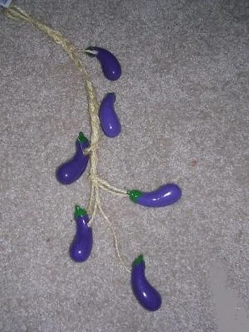 NEW PURPLE CERAMIC EGGPLANT WALL HANGER 22" LONG NEW IN PACKAGE ON ROPE Cover