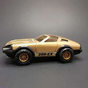 Vtg BUDDY L DATSUN 280-ZX Gold Black minor scratches sticker lifting see pics - Picture 1 of 24