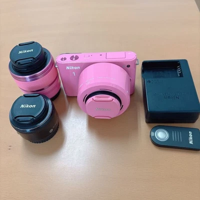 Nikon 1 J1 Pink Mirrorless Camera Set with 3 Lenses 10.1MP Excellent Condition - Image 1 of 4