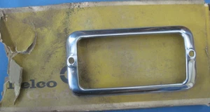 1959-60 CHEVROLET Belair Biscayne OF BACK-UP LAMP BEZEL NOS DELCO - Foto 1 di 2