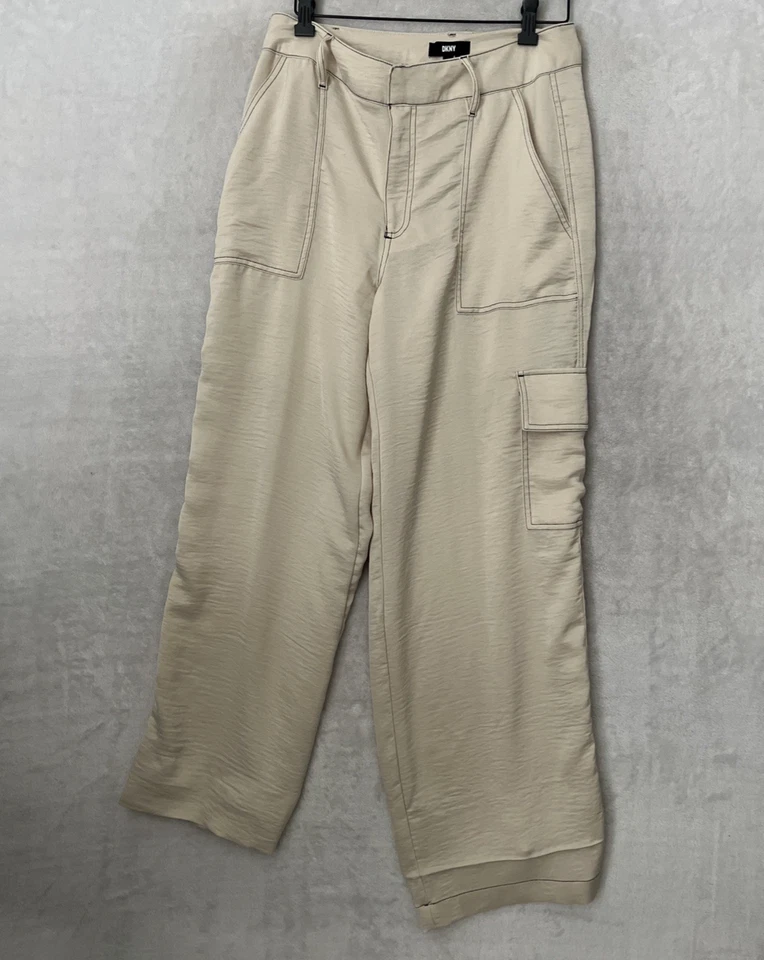 Pantalones DKNY Mujer Beige Sólido 6 Cremallera Botón Mezcla Poliéster Bolsillos Piernas Anchas Foto 1 de 4