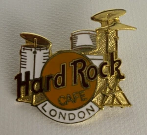 Juego de batería vintage Hard Rock Café London Pin blanco chapado en oro Pinback coleccionable - Imagen 1 de 2