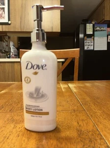 Dove Nourishing Body Care Lotion Essential Dry Skins 8.11 ozs - Picture 1 of 2