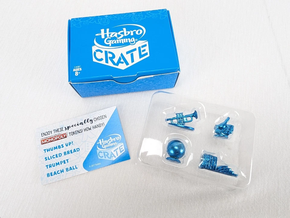 Hasbro Gaming Crate Monopoly Tokens Thumbs Up Sliced Bread Trumpet Beach Ball - Image 1 of 4