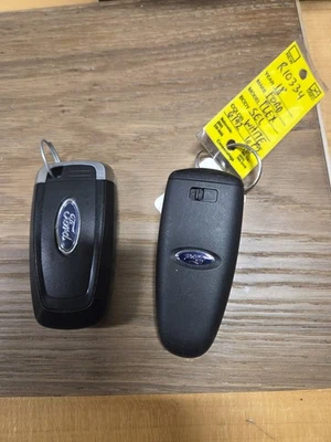 Lot of 2 Used Ford Smart Keys.  Keys are cut. - Image 1 of 2