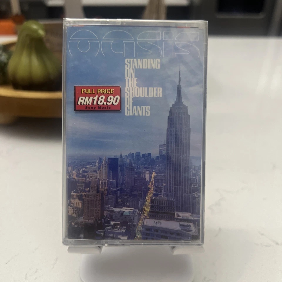 OASIS CASSETTE STANDING ON THE SHOULDER OF GIANTS 2000 SEALED - Image 1 of 4