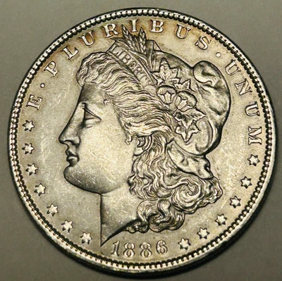 Dólar de plata Morgan 1886-P - Brillante AU / BU Die Break en reverso Foto 1 de 4