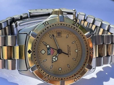 Hermoso reloj de buceo Tag Heuer Lady 2000 esfera dorada para dama Foto 1 de 4