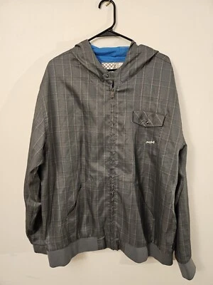 Chaqueta cortavientos excedente nueva sin etiquetas para hombre talla XXL gris a cuadros peso ligero Foto 1 de 4