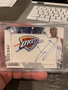2009 10 SERGE IBAKA PANINI ROOKIES & STARS #168 AUTO OKC THUNDER LOGO RC 1/10 SP - Picture 1 of 7