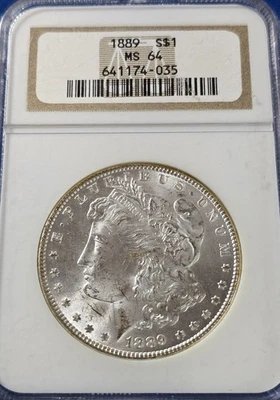 1889 NGC MS 64 Morgan Silver Dollar. OLDER HOLDER  - Image 1 of 2